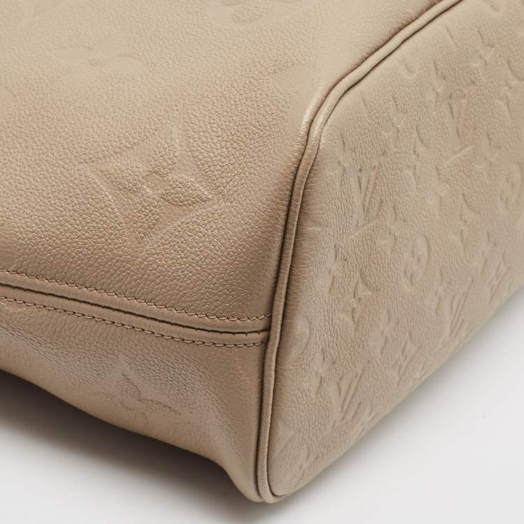 Pre Owned Louis Vuitton Tourterelle Monogram Giant Empreinte Leather Neverfull MM Bag