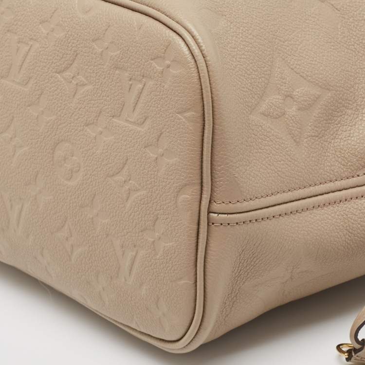 Pre Owned Louis Vuitton Tourterelle Monogram Giant Empreinte Leather Neverfull MM Bag