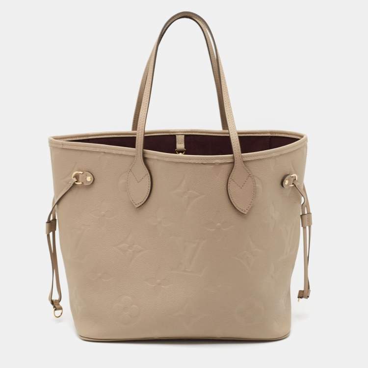 Pre Owned Louis Vuitton Tourterelle Monogram Giant Empreinte Leather Neverfull MM Bag