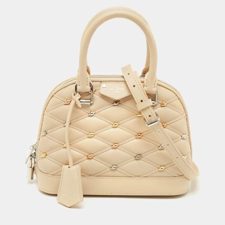 Pre Owned Louis Vuitton Beige Quilted Leather Malletage Alma BB Bag