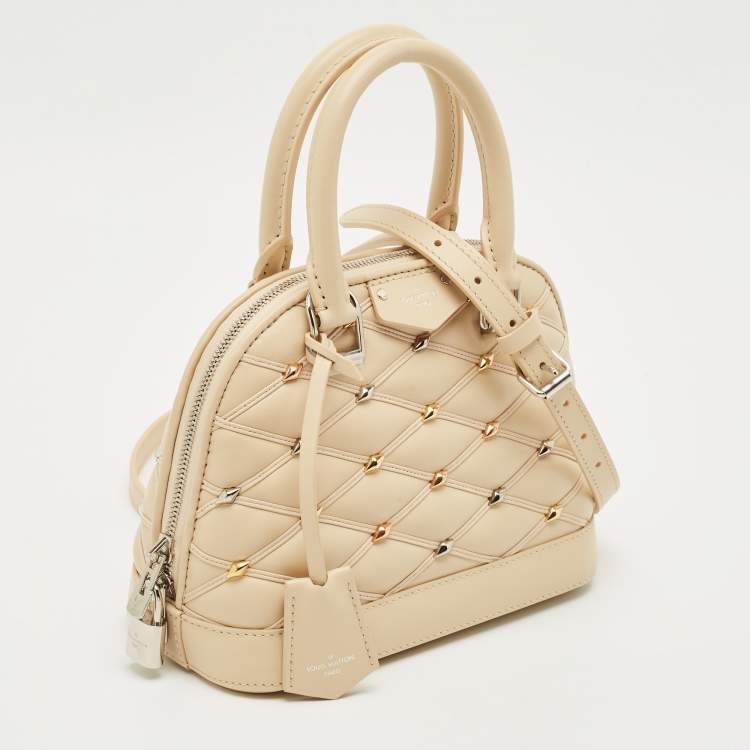 Pre Owned Louis Vuitton Beige Quilted Leather Malletage Alma BB Bag