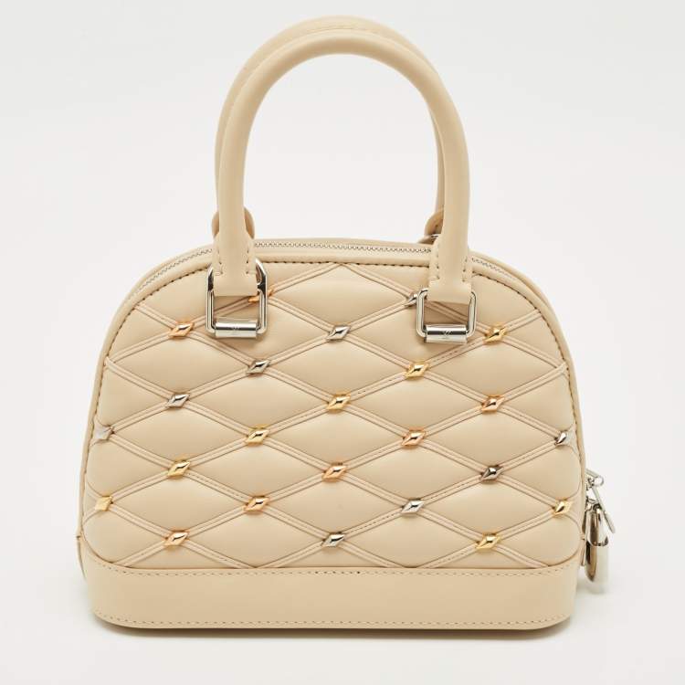 Pre Owned Louis Vuitton Beige Quilted Leather Malletage Alma BB Bag