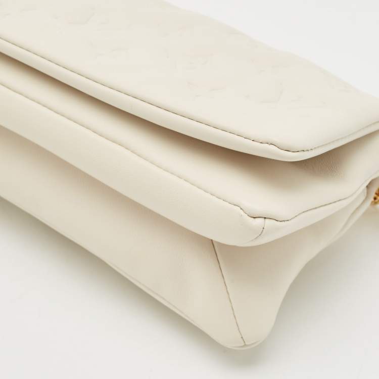 Pre Owned Louis Vuitton White Monogram Embossed Leather Pochette Coussin Bag