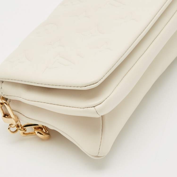 Pre Owned Louis Vuitton White Monogram Embossed Leather Pochette Coussin Bag