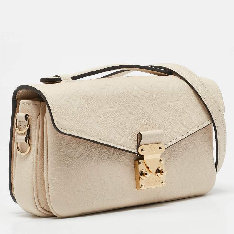 Pre Owned Louis Vuitton Creme Monogram Empreinte Leather Pochette Metis East West Bag