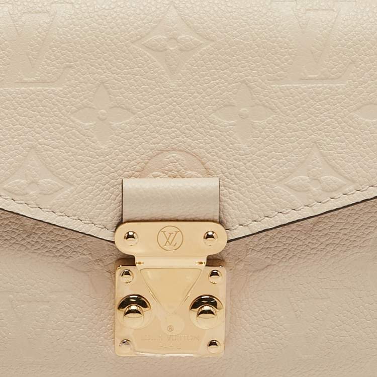 Pre Owned Louis Vuitton Creme Monogram Empreinte Leather Pochette Metis East West Bag
