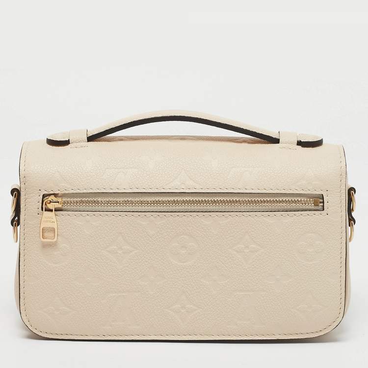 Pre Owned Louis Vuitton Creme Monogram Empreinte Leather Pochette Metis East West Bag