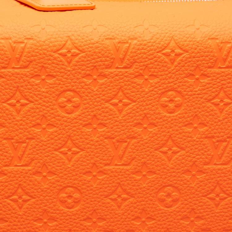 Pre Owned Louis Vuitton Orange Empreinte Leather Horizon 55 Suitcase
