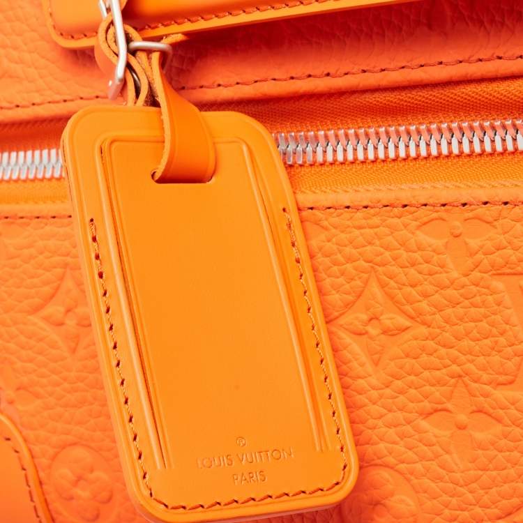 Pre Owned Louis Vuitton Orange Empreinte Leather Horizon 55 Suitcase
