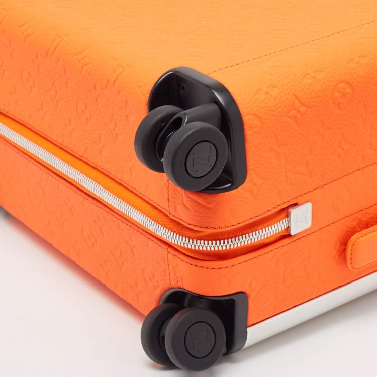 Pre Owned Louis Vuitton Orange Empreinte Leather Horizon 55 Suitcase