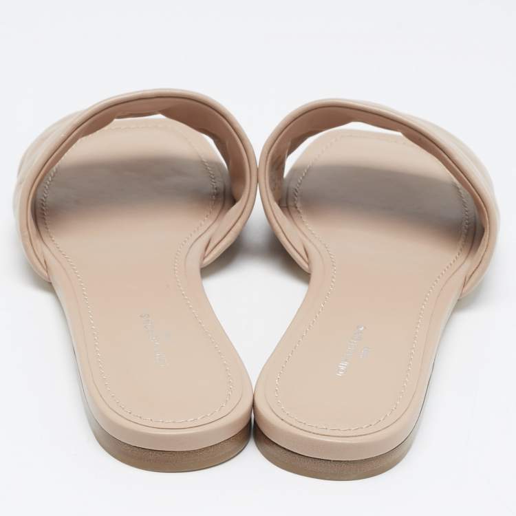Pre Owned Louis Vuitton Dusty Pink Monogram Embossed Leather Revival Flat Slides Size 38