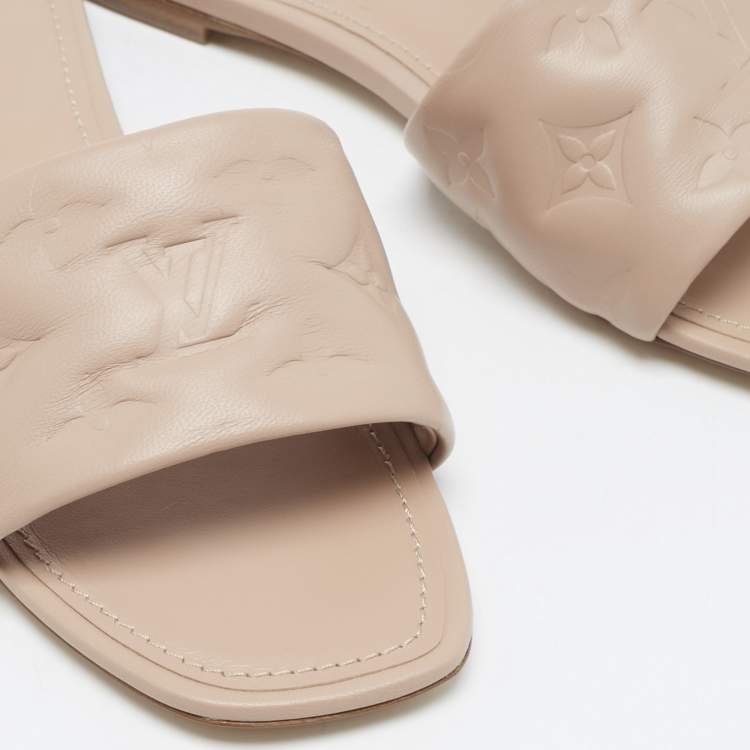 Pre Owned Louis Vuitton Dusty Pink Monogram Embossed Leather Revival Flat Slides Size 38