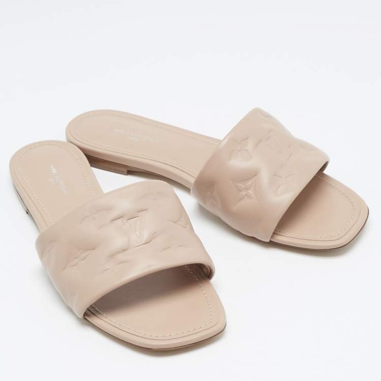 Pre Owned Louis Vuitton Dusty Pink Monogram Embossed Leather Revival Flat Slides Size 38