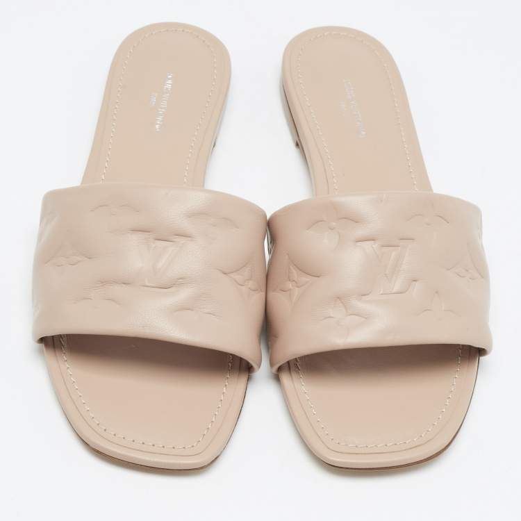Pre Owned Louis Vuitton Dusty Pink Monogram Embossed Leather Revival Flat Slides Size 38