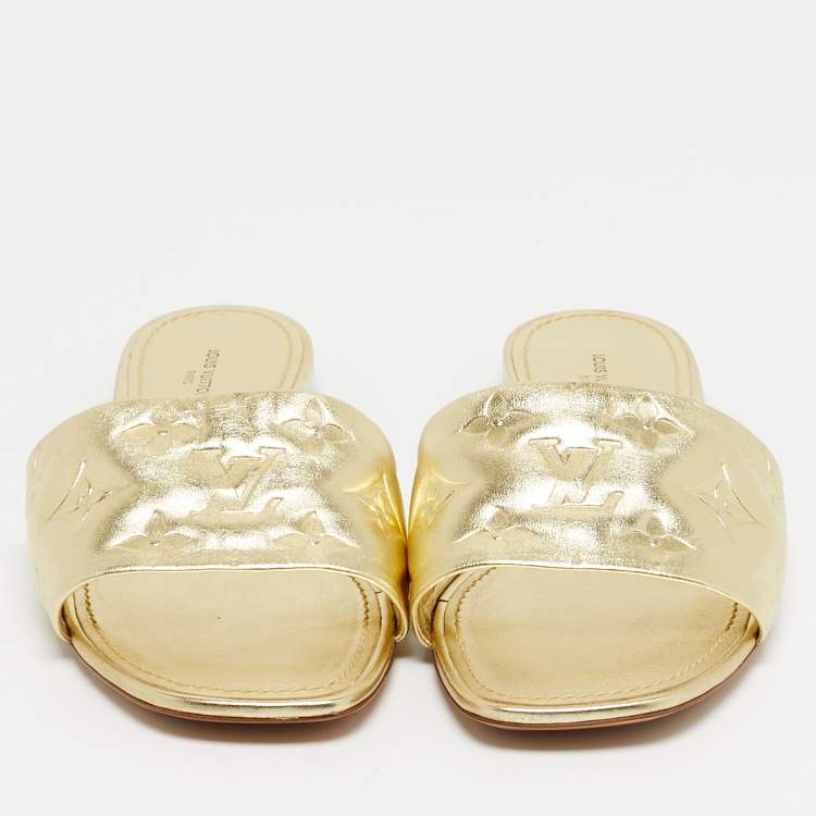 Pre Owned Louis Vuitton Gold Monogram Embossed Leather Revival Flat Slides Size 37.5