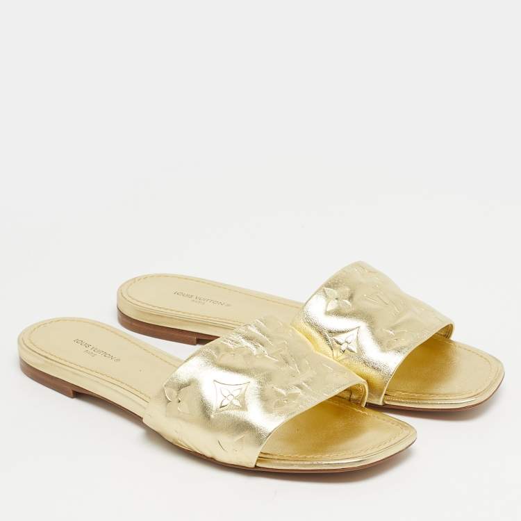 Pre Owned Louis Vuitton Gold Monogram Embossed Leather Revival Flat Slides Size 37.5