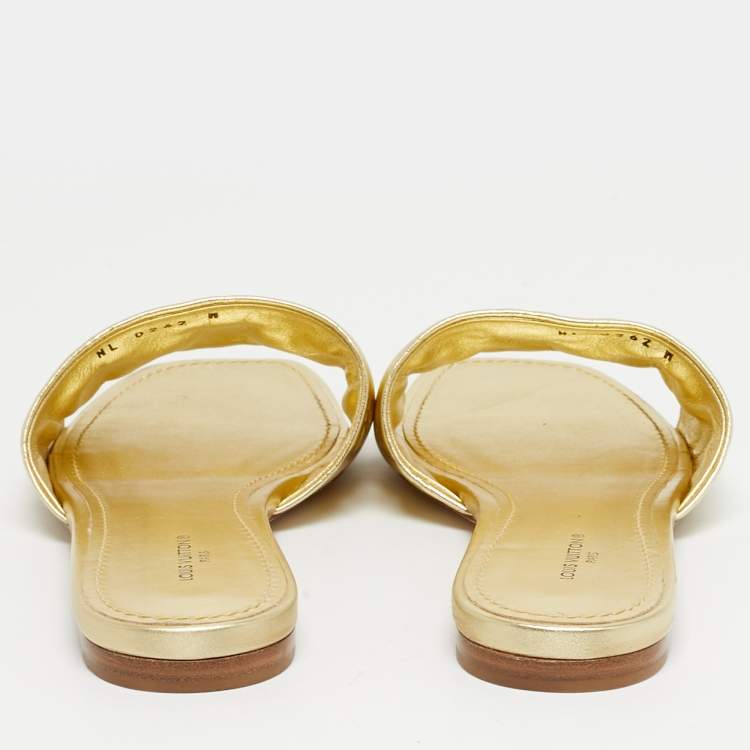 Pre Owned Louis Vuitton Gold Monogram Embossed Leather Revival Flat Slides Size 37.5