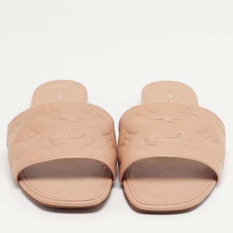 Pre Owned Louis Vuitton Dusty Pink Monogram Embossed Leather Revival Flat Slides Size 38