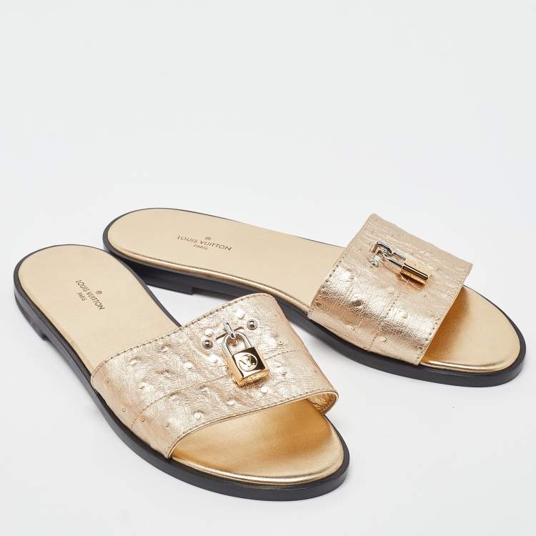 Pre Owned Louis Vuitton Gold Ostrich Leather Lock It Flat Sandals Size 38