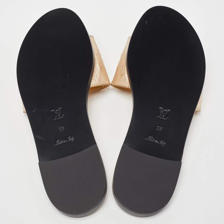 Pre Owned Louis Vuitton Gold Ostrich Leather Lock It Flat Sandals Size 38