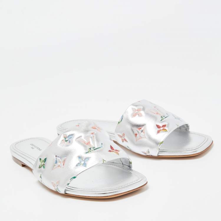 Pre Owned Louis Vuitton Silver Monogram Embossed Leather Revival Flat Slides Size 39