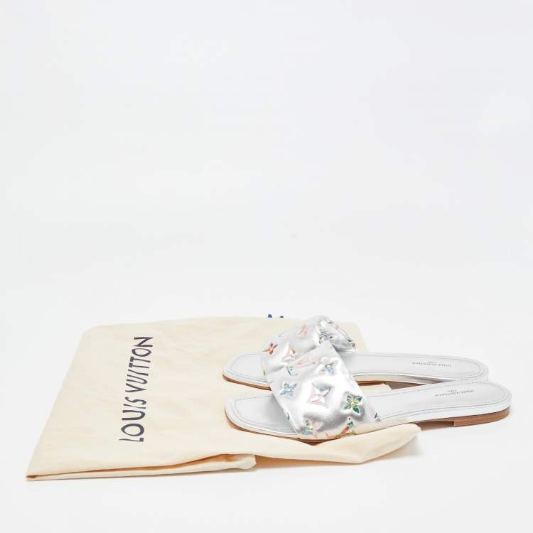 Pre Owned Louis Vuitton Silver Monogram Embossed Leather Revival Flat Slides Size 39