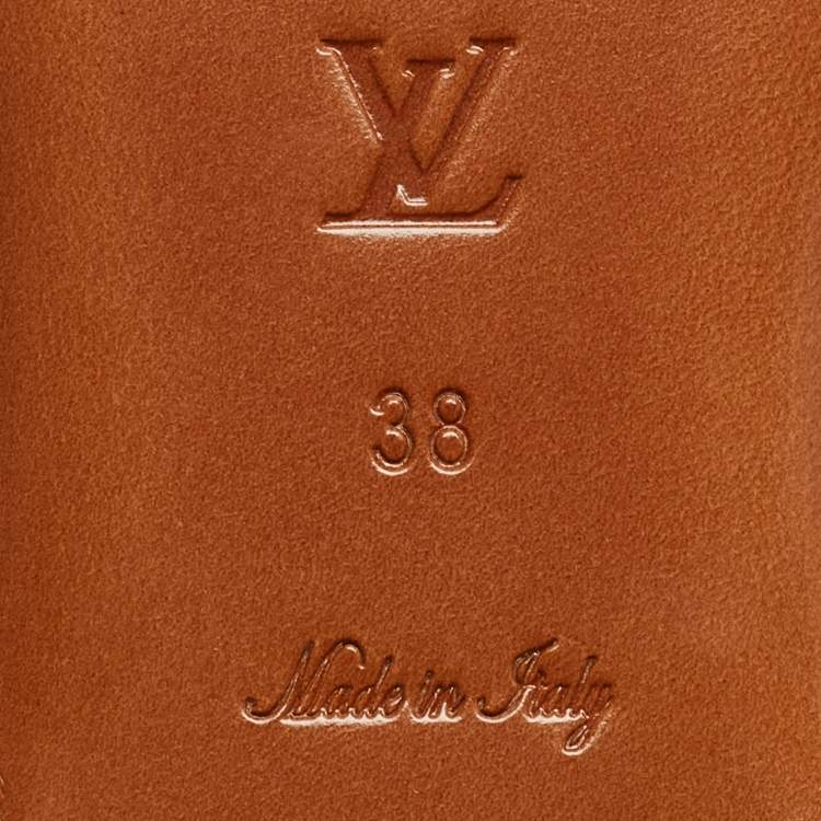 Pre Owned Louis Vuitton Beige Monogram Embossed Leather Revival Flat Mules Size 38