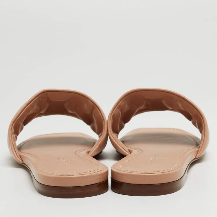 Pre Owned Louis Vuitton Beige Monogram Embossed Leather Revival Flat Mules Size 38