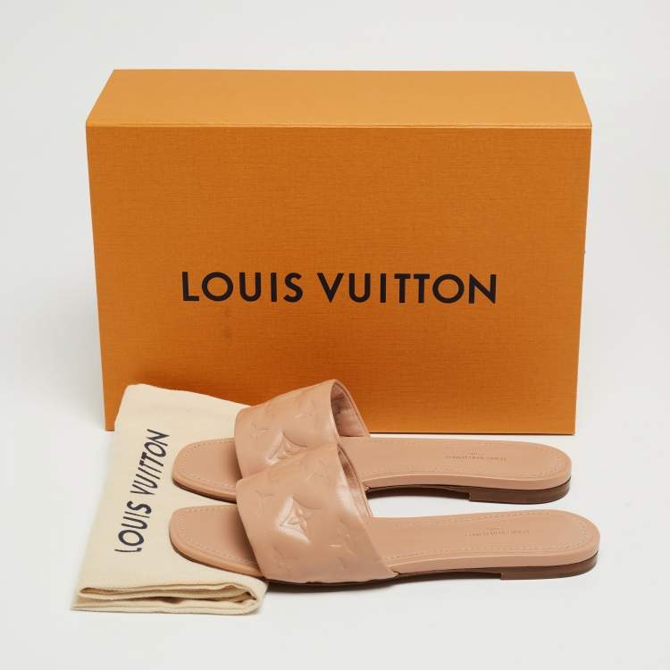Pre Owned Louis Vuitton Beige Monogram Embossed Leather Revival Flat Mules Size 38