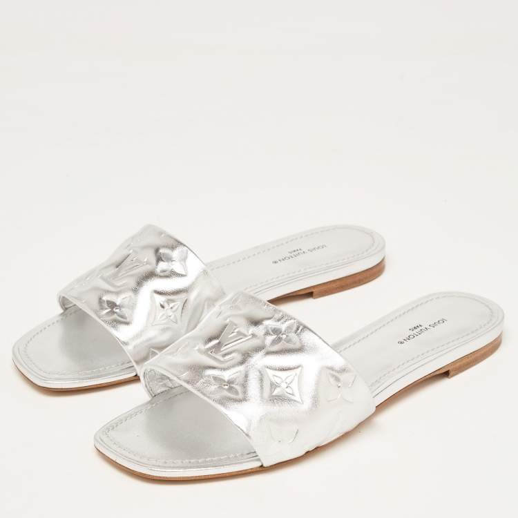 Pre Owned Louis Vuitton Silver Monogram Embossed Leather Revival Flat Slides Size 38