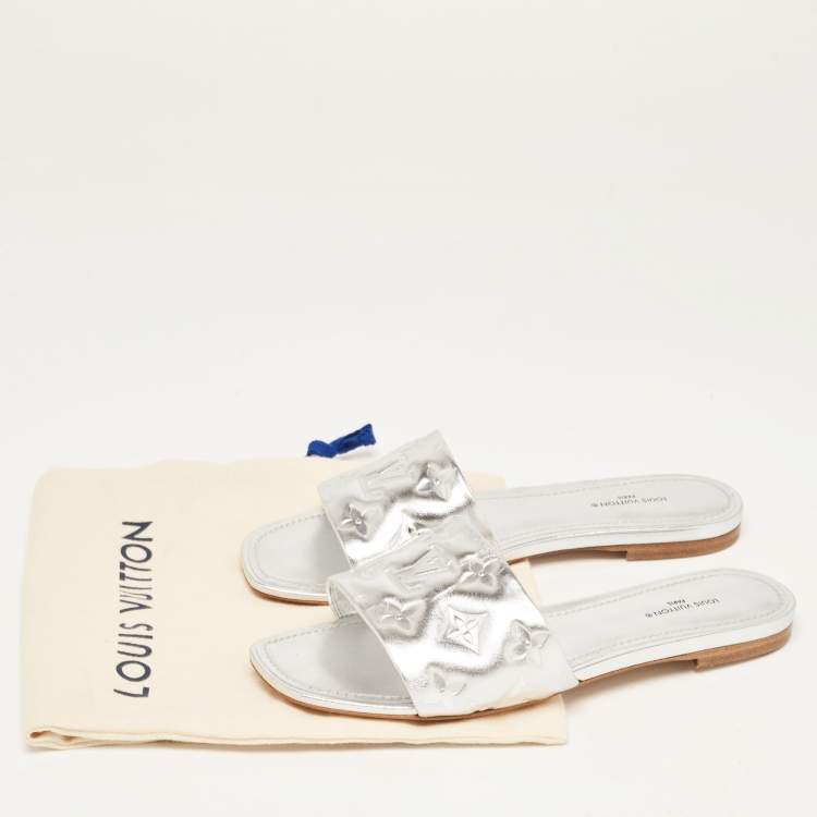 Pre Owned Louis Vuitton Silver Monogram Embossed Leather Revival Flat Slides Size 38