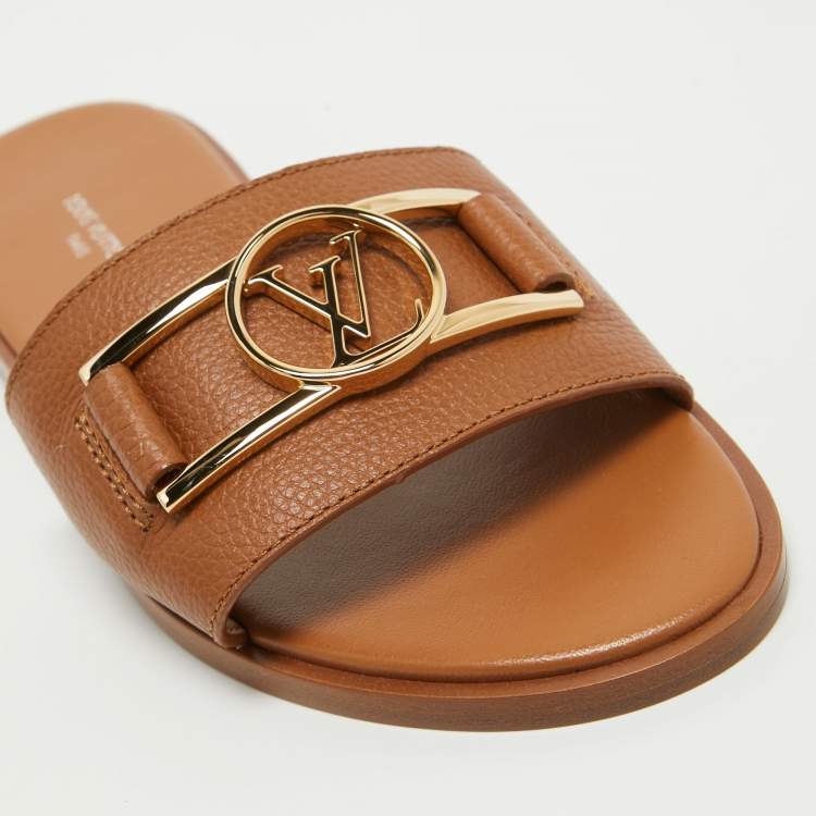 مملوكة مسبقًا Louis Vuitton Tan Leather Lock It Flat Slides Size 36