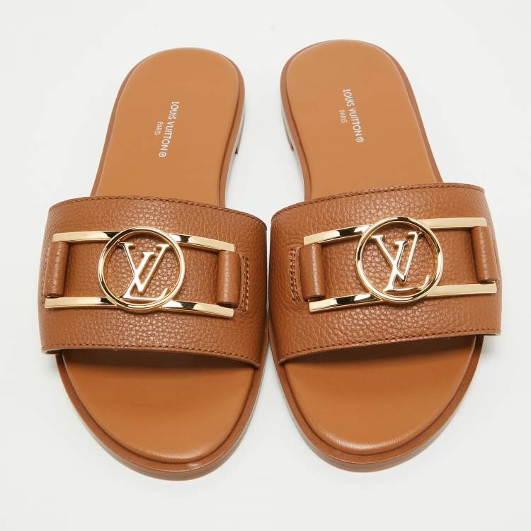 مم�لوكة مسبقًا Louis Vuitton Tan Leather Lock It Flat Slides Size 36