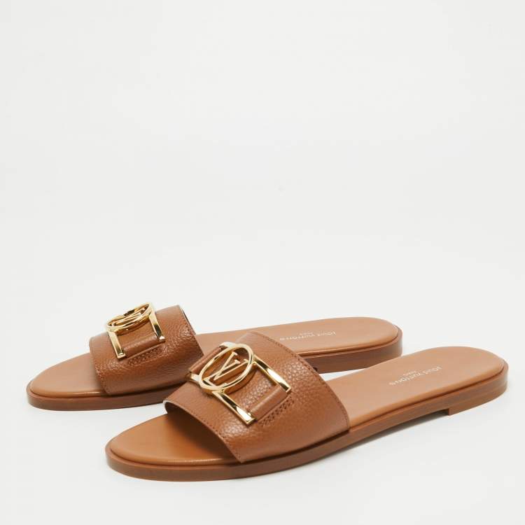 Pre Owned Louis Vuitton Tan Leather Lock It Flat Slides Size 37