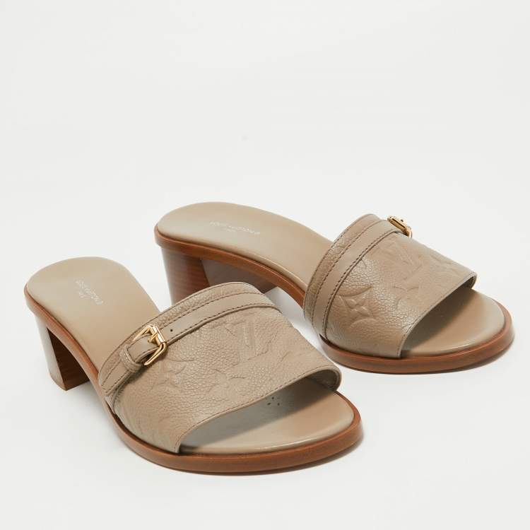 Pre Owned Louis Vuitton Beige Monogram Embossed Leather Block Heel Slide Sandals Size 40