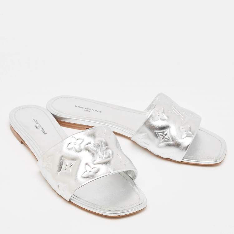 Pre Owned Louis Vuitton Silver Monogram Embossed Leather Revival Flat Slides Size 38