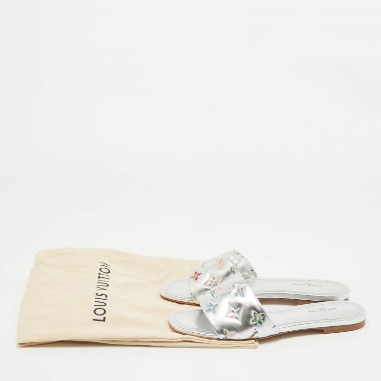 Pre Owned Louis Vuitton Silver Monogram Embossed Leather Revival Flat Slides Size 37
