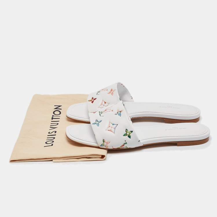 Pre Owned Louis Vuitton White Monogram Embossed Leather Revival Flat Slides Size 37