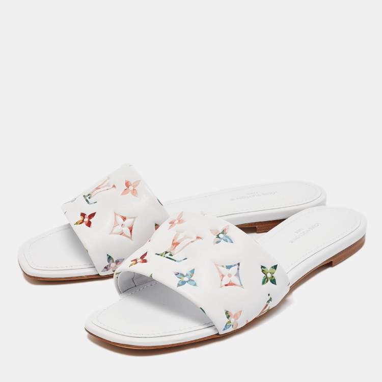 Pre Owned Louis Vuitton White Monogram Embossed Leather Revival Flat Slides Size 37