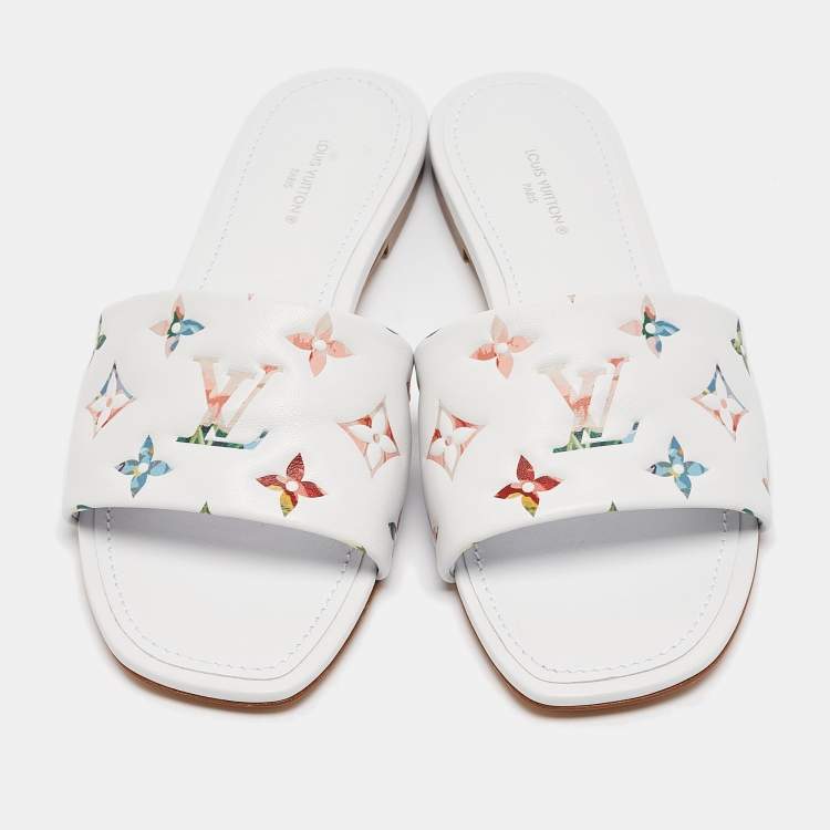Pre Owned Louis Vuitton White Monogram Embossed Leather Revival Flat Slides Size 37