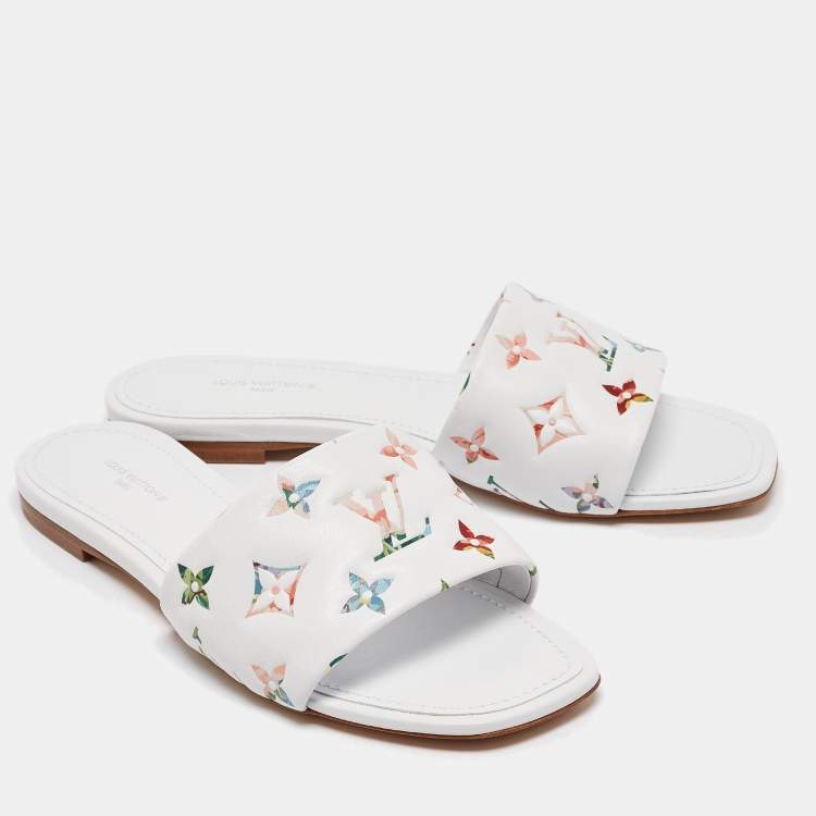 Pre Owned Louis Vuitton White Monogram Embossed Leather Revival Flat Slides Size 37