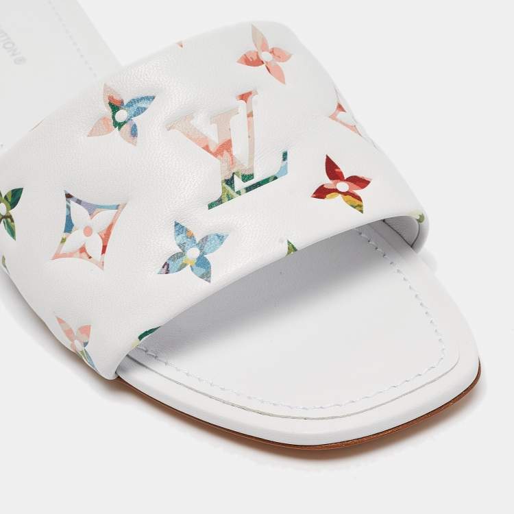 Pre Owned Louis Vuitton White Monogram Embossed Leather Revival Flat Slides Size 37