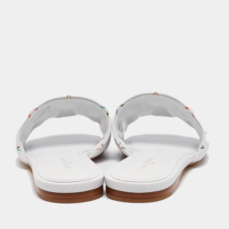 Pre Owned Louis Vuitton White Monogram Embossed Leather Revival Flat Slides Size 37