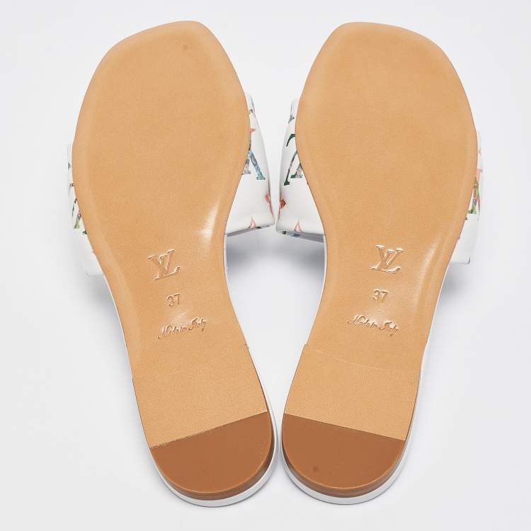 Pre Owned Louis Vuitton White Monogram Embossed Leather Revival Flat Slides Size 37
