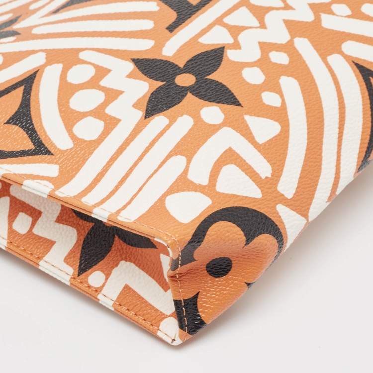 Pre Owned Louis Vuitton Cream/Caramel Monogram Giant Crafty Canvas Toiletry Pouch 26