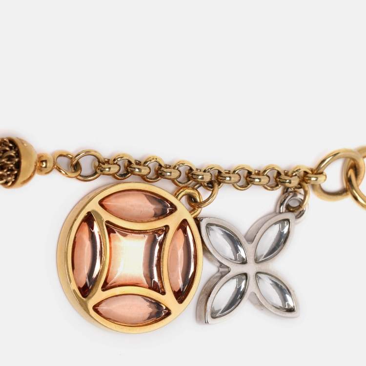 مملوكة مسبقًا حامل مفاتيح وتعرقة حقيبة لوي فيتون مونوغرام كريستال ذهبي نهائي معدني بشرابة