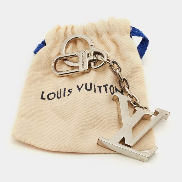 Pre Owned Louis Vuitton Logo Silver Tone Keychain