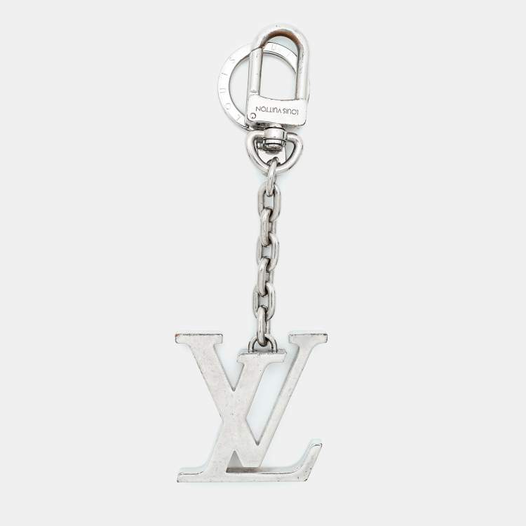 Pre Owned Louis Vuitton Logo Silver Tone Keychain