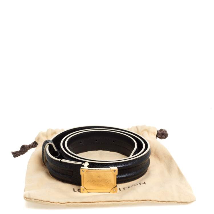 black belt with gold square buckle