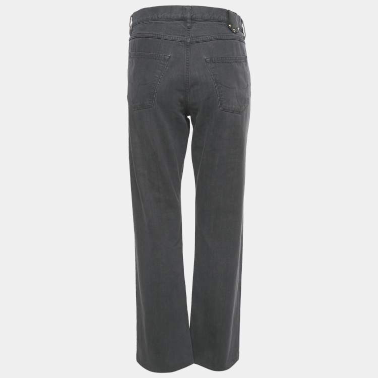 مملوكة مسبقًا بنطلون جينز لوي فيتون دنيم أزرق بتفاصيل الشعار أرجل واسعة مقاس وسط 29 بوصة